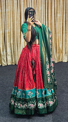 Exquisite Red Lehenga with Green Blouse Rich Flair & Traditional Minakari Work