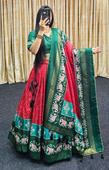 Exquisite Red Lehenga with Green Blouse Rich Flair & Traditional Minakari Work